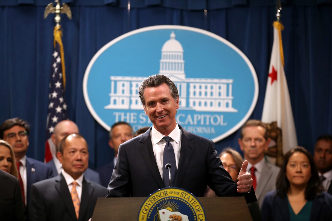 California Gov. Gavin Newsom speaks during a news conference with California attorney General Xavier Becerra.