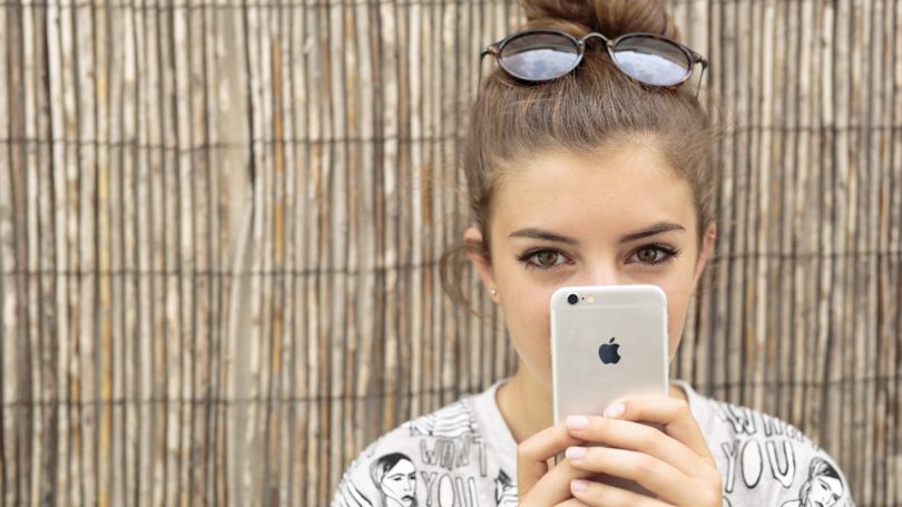 Teenager With Iphone Apple Vacation