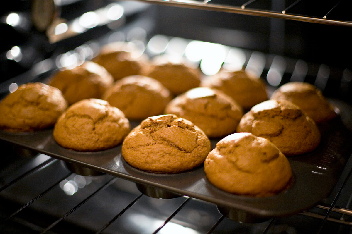 Baked pumpkin muffins just coming out of the oven
