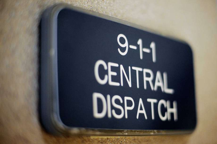 FILE -- A sign at the entrance to the Midland Central Dispatch Authority office in the Law Enforcement Center. (Nick King/Midland Daily News file) / Midland Daily News