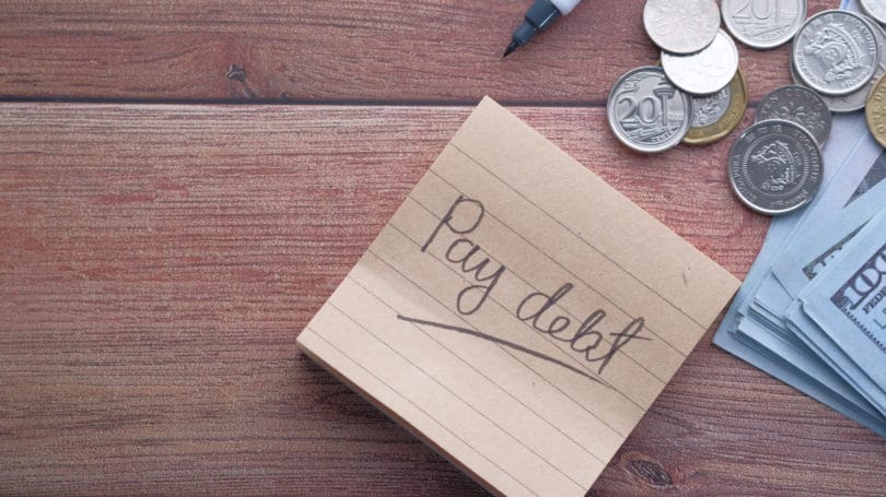Pay Off Debt Post It Coins Cash